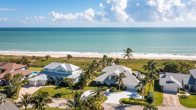 bird's eye view with a view of the beach and a water view