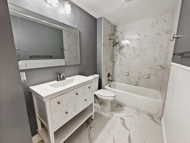 full bathroom featuring tile floors, tiled shower / bath combo, vanity, and toilet