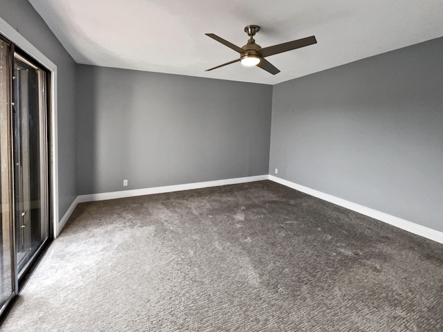 carpeted empty room featuring ceiling fan