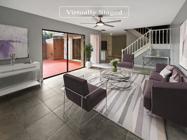 living room featuring tile flooring and ceiling fan