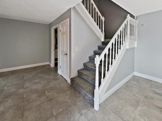 staircase with tile floors