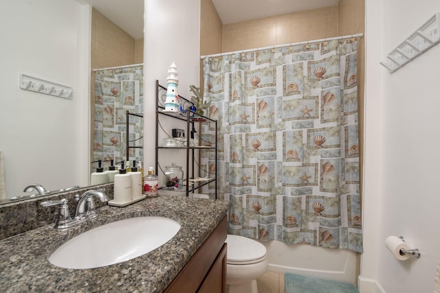 full bathroom featuring shower / bath combo, vanity, and toilet