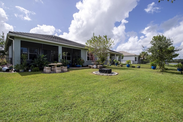 view of yard featuring a fire pit