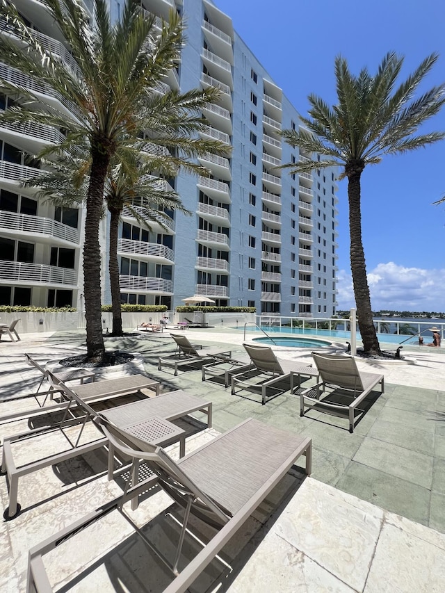 view of swimming pool featuring a patio