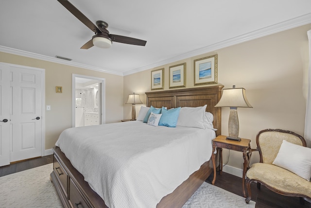 bedroom with connected bathroom, ornamental molding, ceiling fan, and dark hardwood / wood-style floors