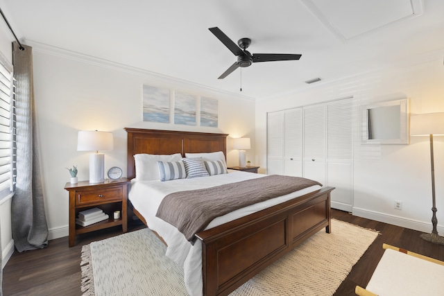 bedroom featuring crown molding, a closet, ceiling fan, and dark hardwood / wood-style flooring