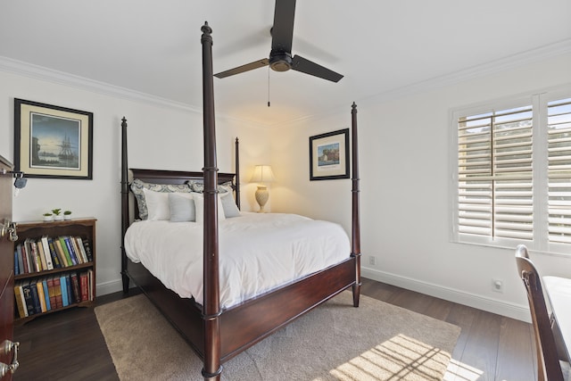 bedroom with dark hardwood / wood-style flooring, ornamental molding, and ceiling fan