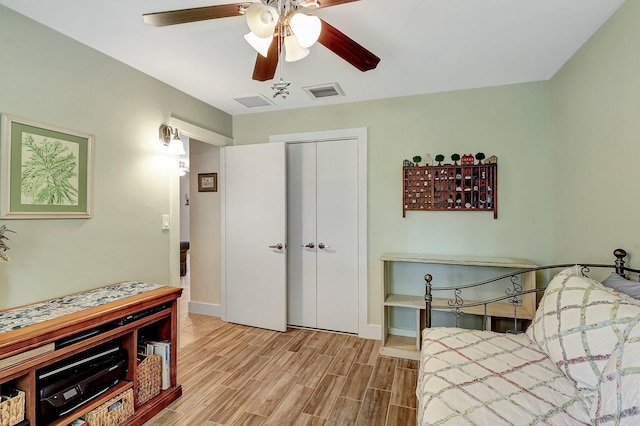 bedroom featuring a closet and ceiling fan