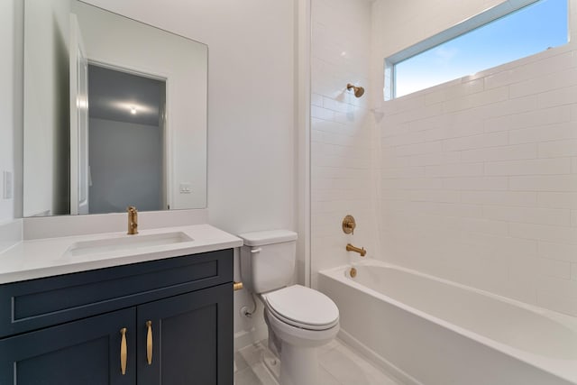 full bathroom featuring vanity, toilet, and tiled shower / bath