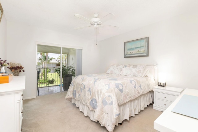 carpeted bedroom featuring ceiling fan and access to outside