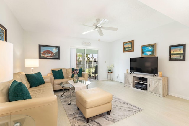 living room featuring ceiling fan