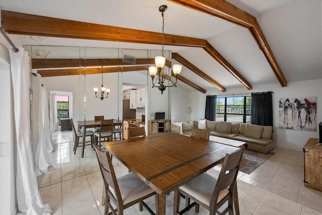 tiled dining area featuring a chandelier, lofted ceiling with beams, and a wealth of natural light