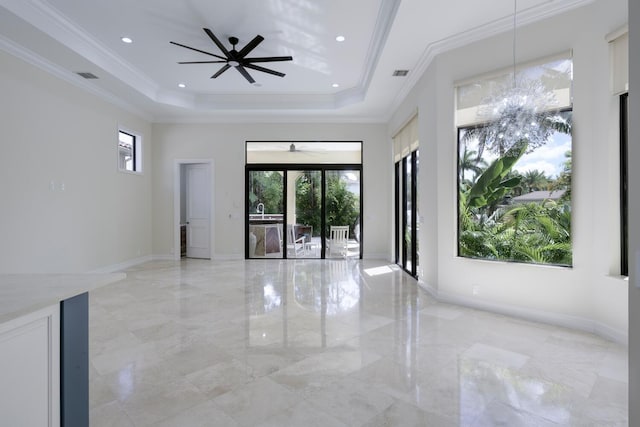 unfurnished room with plenty of natural light, ceiling fan, and ornamental molding