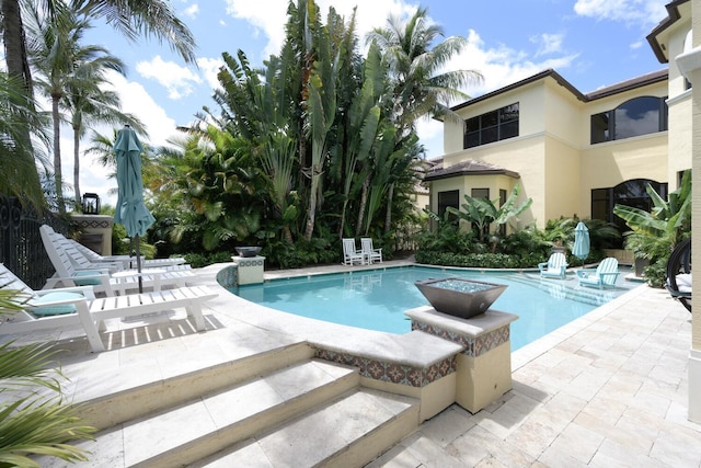 view of pool with a patio