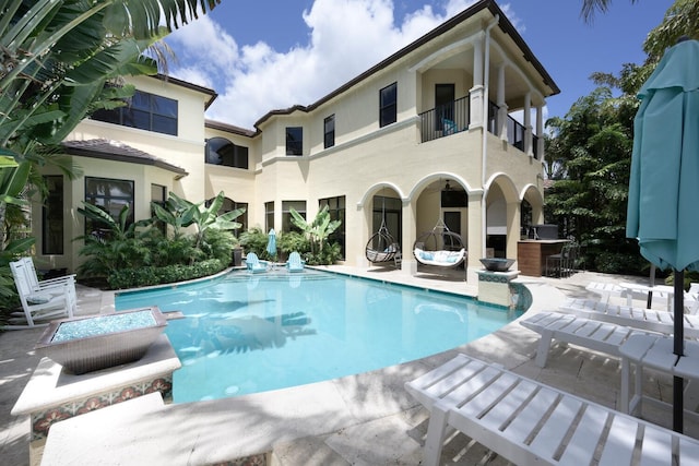 view of pool with a patio