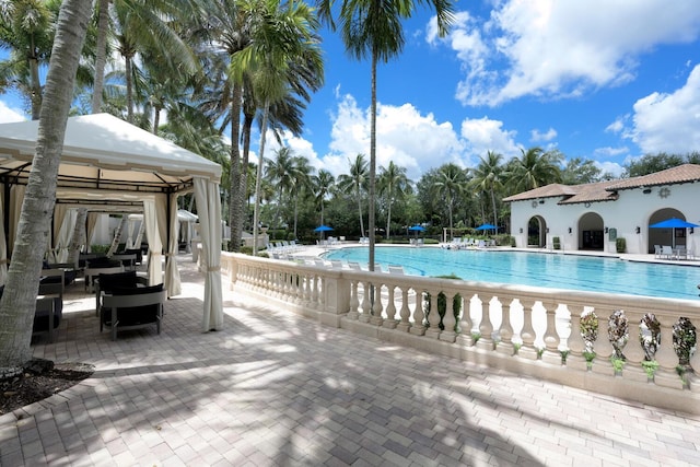 view of pool featuring a gazebo and a patio