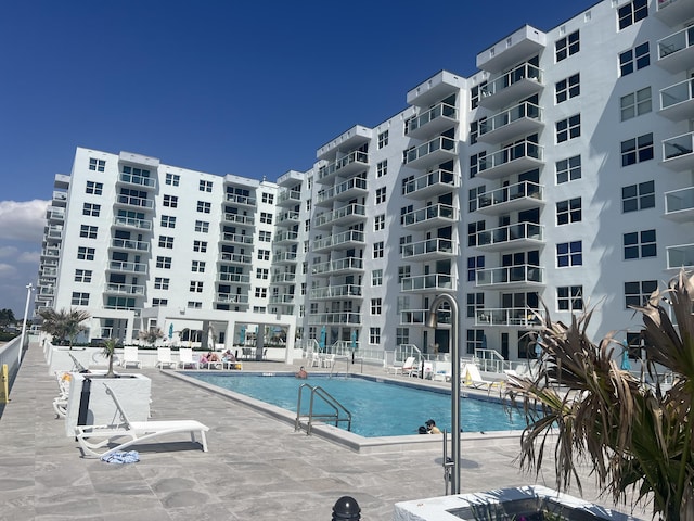 community pool featuring a patio