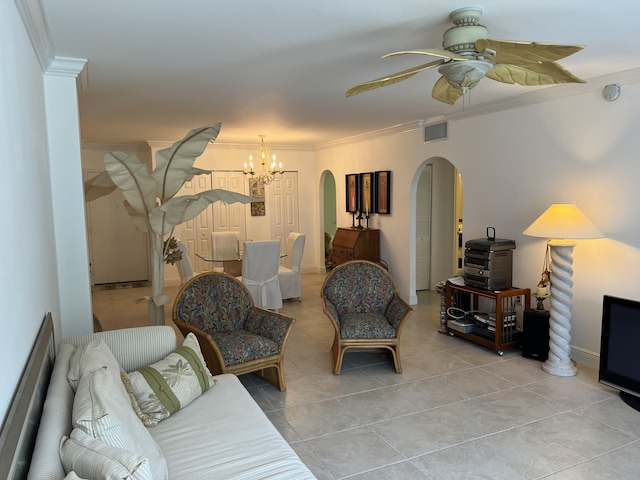 living room with arched walkways, light tile patterned floors, ceiling fan with notable chandelier, visible vents, and crown molding