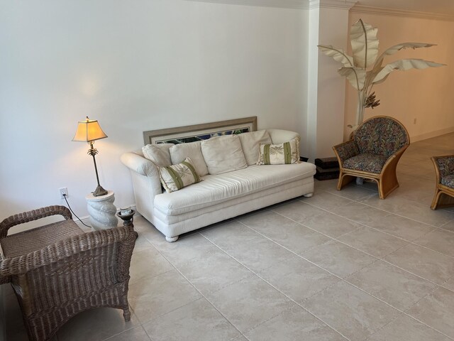 interior space featuring ornamental molding and light tile patterned floors