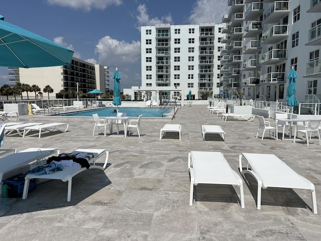 community pool featuring a patio