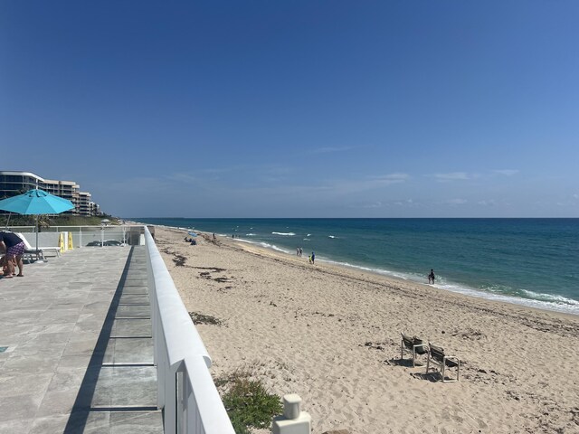 property view of water with a beach view