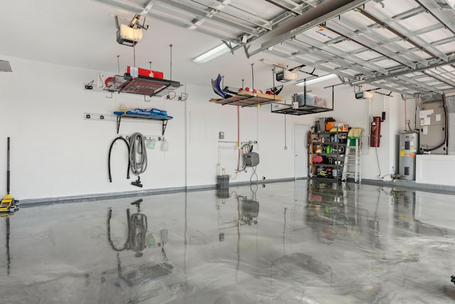 garage featuring a garage door opener and water heater