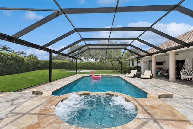 view of swimming pool featuring pool water feature, an in ground hot tub, a lanai, and a patio