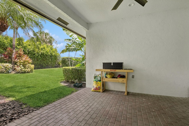 view of patio with ceiling fan