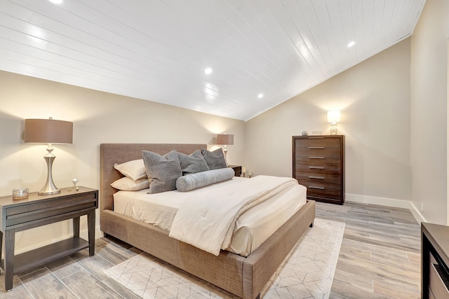 bedroom with wood ceiling and lofted ceiling