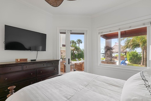 bedroom with access to exterior and ornamental molding