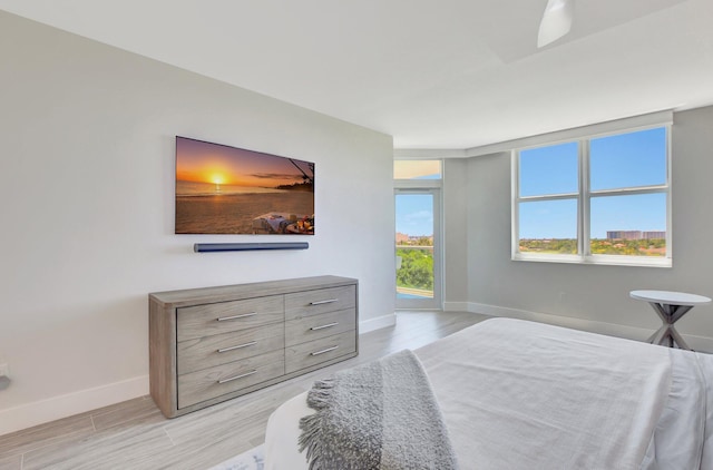 bedroom with light hardwood / wood-style flooring