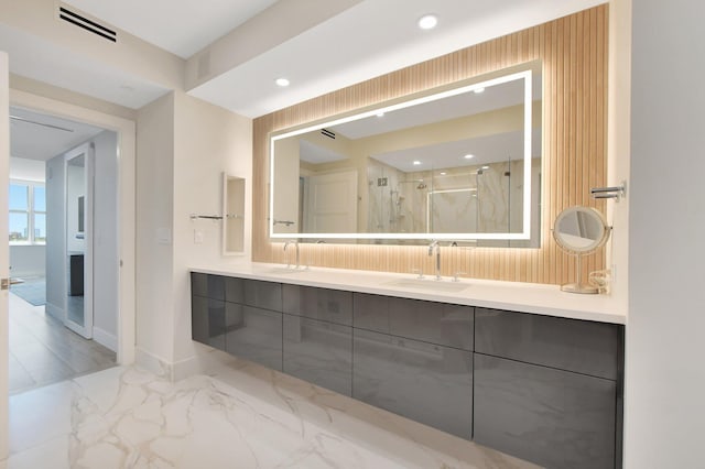 bathroom with vanity and an enclosed shower