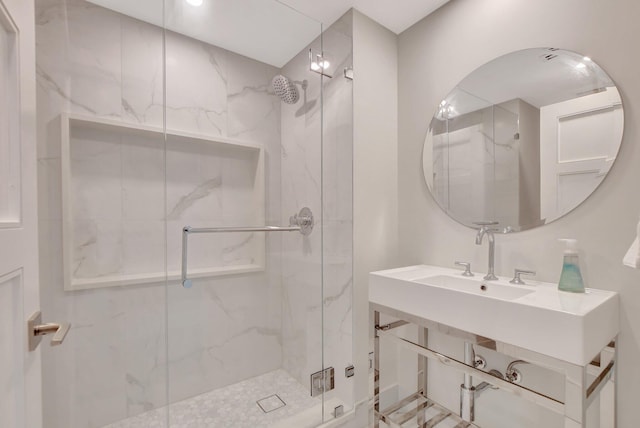 bathroom featuring an enclosed shower