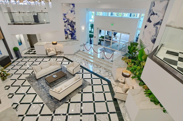 living room with a high ceiling