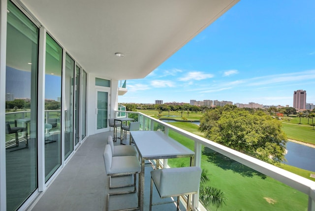 balcony featuring a water view