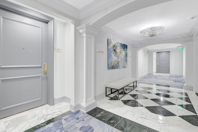 corridor featuring ornamental molding and decorative columns