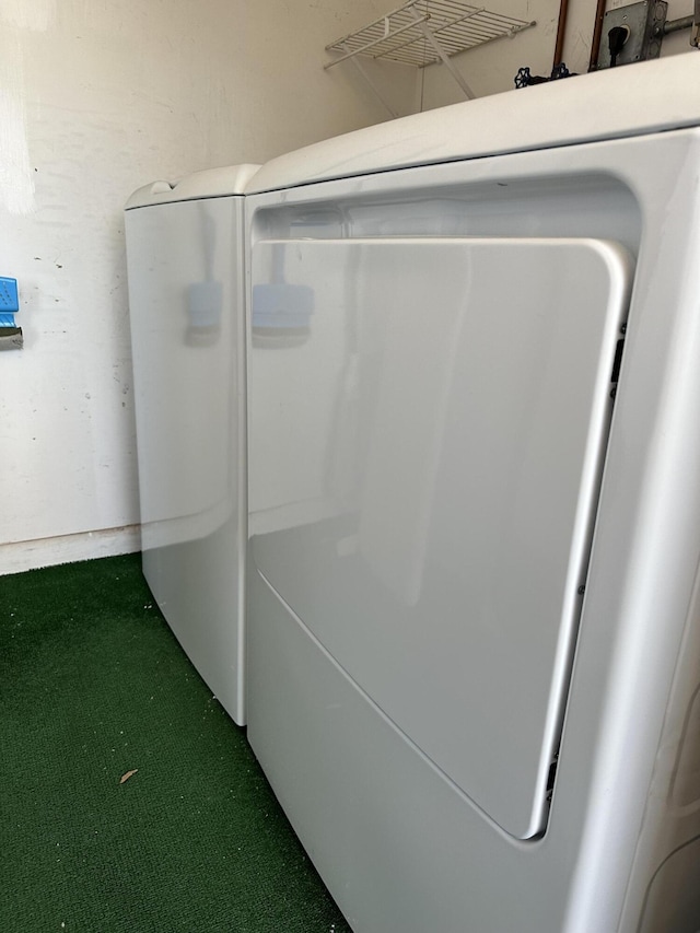 interior space featuring washer / dryer and carpet flooring