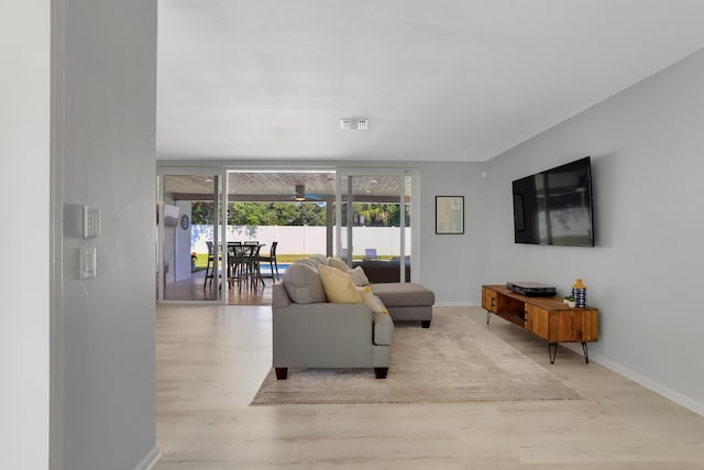 living room with hardwood / wood-style flooring