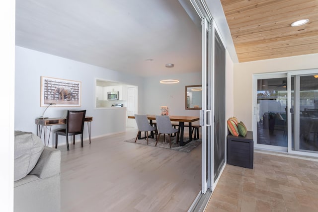 dining area with wood ceiling