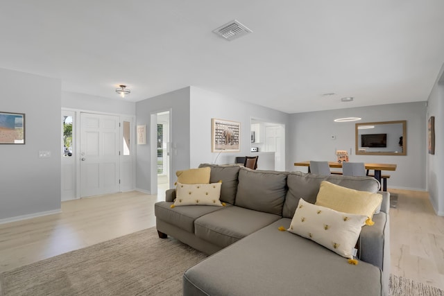 living room featuring light wood-type flooring