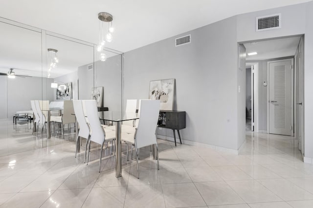 kitchen featuring white cabinets, white appliances, light tile patterned floors, and sink