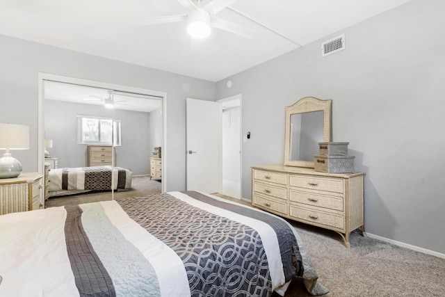 bedroom with ceiling fan, a closet, and carpet floors