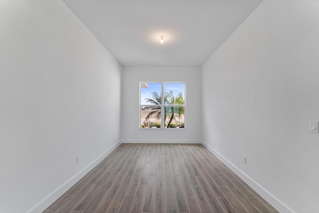 empty room featuring hardwood / wood-style floors