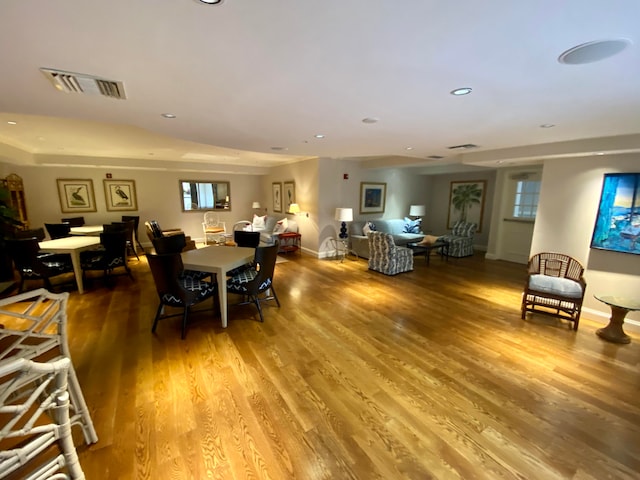 dining room with hardwood / wood-style floors