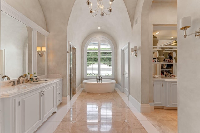 bathroom featuring tile flooring, built in shelves, a chandelier, high vaulted ceiling, and vanity