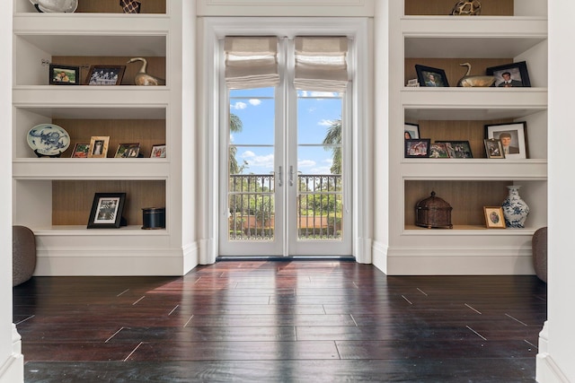 entryway featuring french doors, built in features, and dark hardwood / wood-style floors