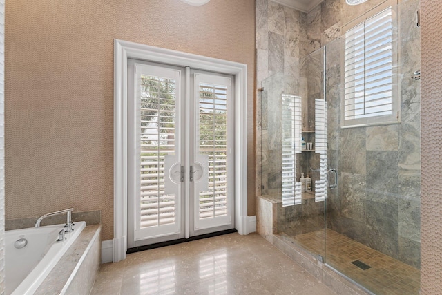 bathroom featuring independent shower and bath and tile flooring