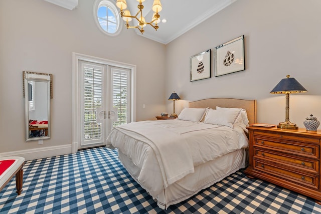 bedroom featuring a notable chandelier and access to exterior