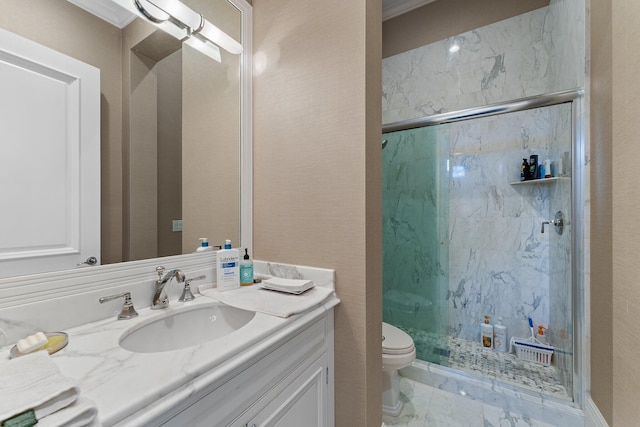 bathroom with a shower with shower door, vanity with extensive cabinet space, toilet, and tile floors