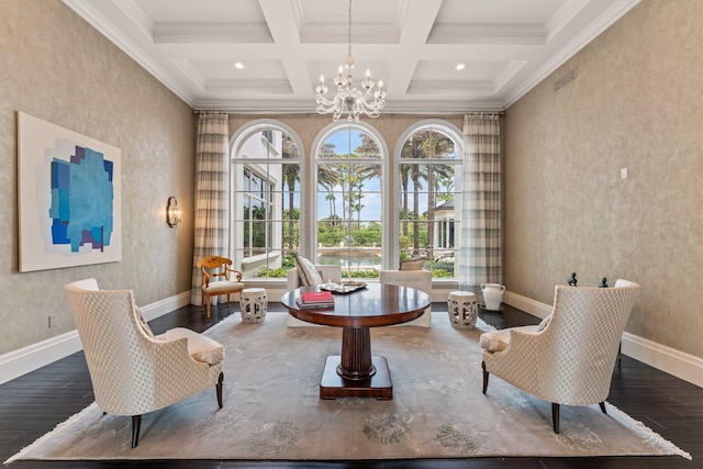 sitting room with crown molding, hardwood / wood-style floors, beam ceiling, a chandelier, and coffered ceiling